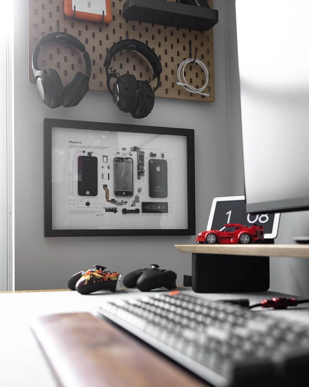 Close-up of Cam Dicecca's desk setup showing the Deltahub Carpio wrist rest, Dell curved monitor, and clean cable management