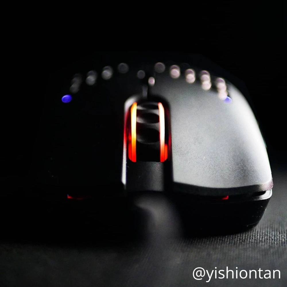 Lightweight gaming mice comparison showing honeycomb shell designs and weight-saving features from top manufacturers